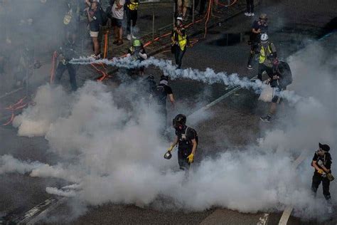 Hong Kong Protesters Hurl Gasoline Bombs At Government Offices The