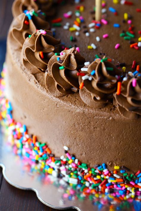Use large confetti sprinkles or sugar coated chocolate sprinkles for a minimalist look or mix them with smaller sprinkles to make them stand out. Peanut Butter Swiss Meringue Chocolate Cake - Mom Loves Baking