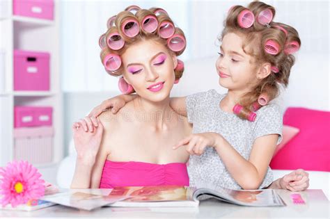 mother and daughter in hair curlers stock image image of fashion curlers 78360169