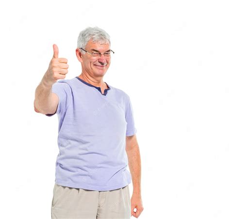 Free Photo A Cheerful Casual Old Man Giving A Thumbs Up