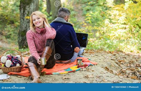 Working On Fresh Air Happy Loving Couple Relaxing In Park With Laptop