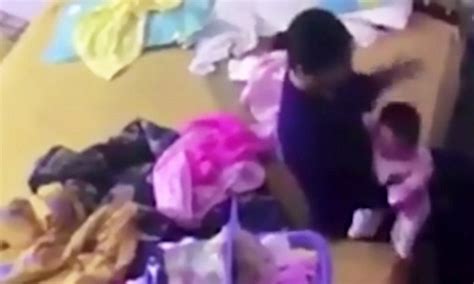 Vietnamese Babysitter Caught On Camera Hitting A Baby Daily Mail Online