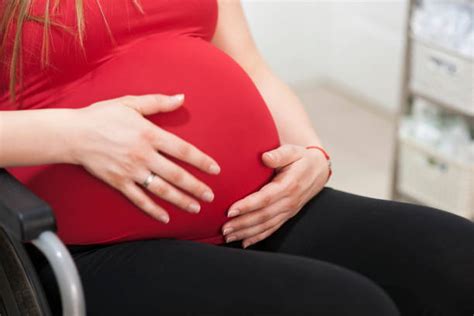 Pregnant Woman In Wheelchair Stock Photos Pictures And Royalty Free