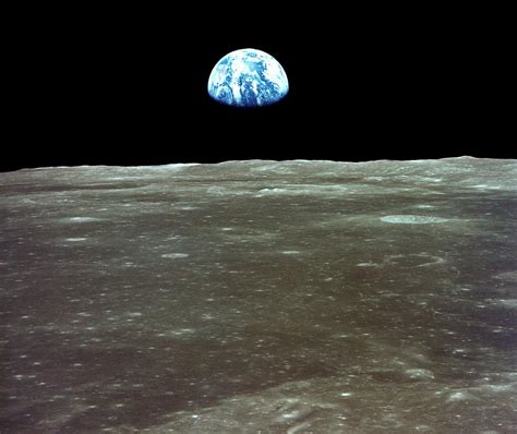 Apollo 11 View Of Earth Rising Over Moons Horizon Photograph By Nasa