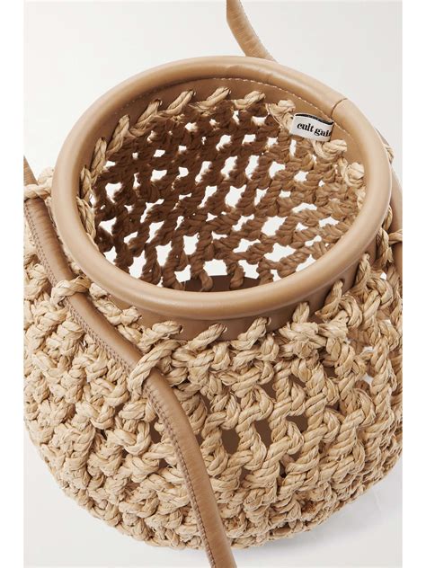 CULT GAIA Enya leather-trimmed raffia bucket bag | NET-A-PORTER