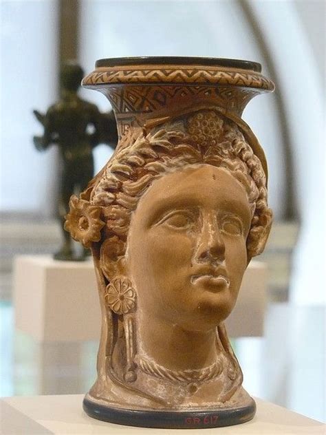 terracotta oinochoe jug in the form of a woman s head etruscan late 4th century bce ancient