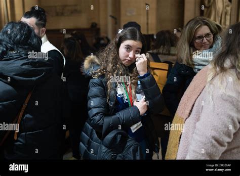 A Woman Cries Next To A Temporary Courtroom During The Verdicts Day