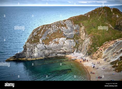A Natural Bay Formed By The Geology In Dorset Near Durdle Door Gives A
