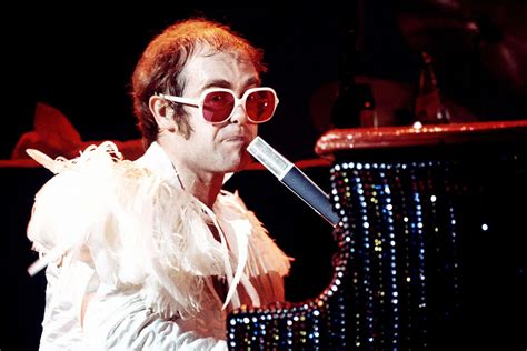 Elton John Style The Rocketmans Fashion Evolution