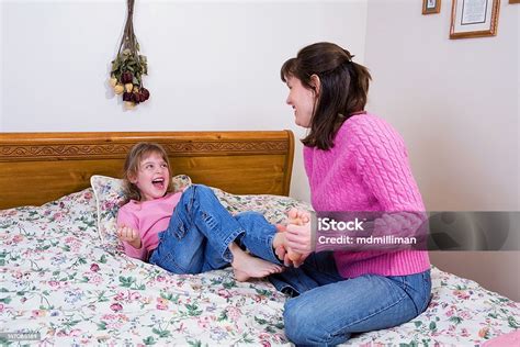 Tickle Time Stock Photo Download Image Now Tickling Adult Bed