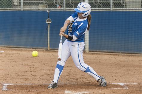 About 40 million americans play a game of softball in any given year. Softball strengthens team ties with 'wolf pack' motto ...