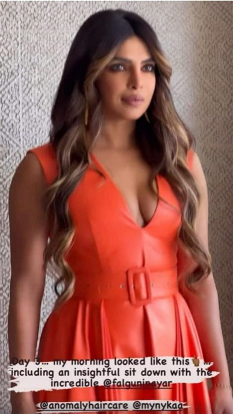 Priyanka Chopras Electrifying Look In Sexy Plunging Neckline Orange Dress