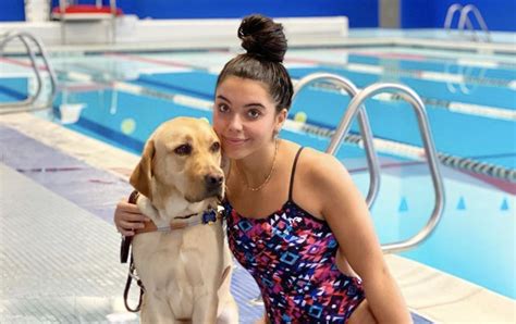 Blind Teen Swimmer Works With Guide Dog As The Perfect Pair To Enter