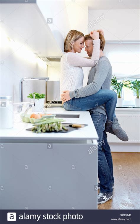 Beautiful Couple Hugging In The Kitchen Xxx Porn