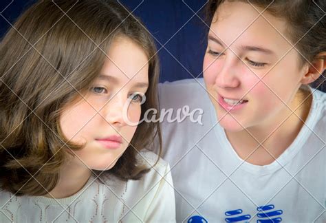 Two Teenage Girls Talking Photos By Canva