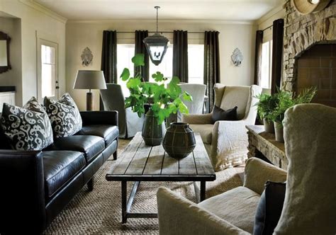 We actually had a leather sofa in our old house, but it was simply too big in scale for this house. How To Decorate A Living Room With A Black Leather Sofa ...