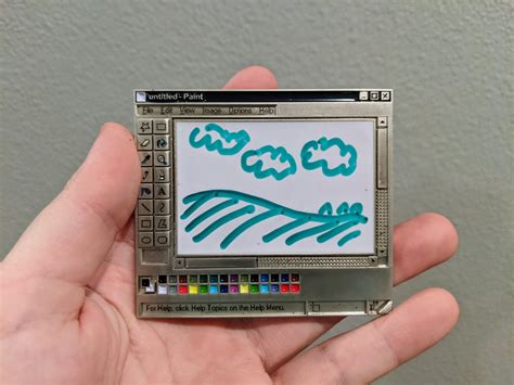 An Enamel Pin With Functional Whiteboard That Looks Like The Windows 95