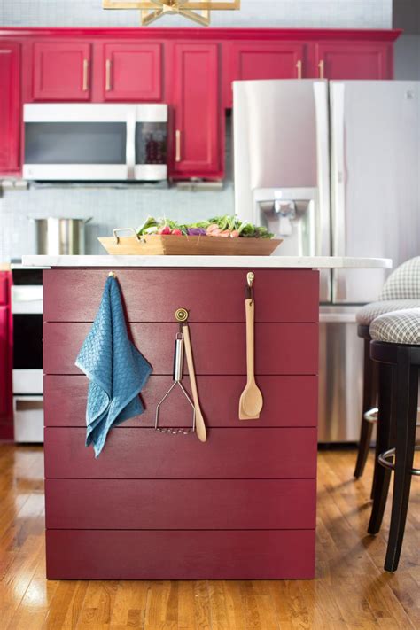 I'm leaning towards stain vs paint since i feel the grey cabinets trend is ending and white cabinets would be a chore to keep pristine and like new. Red Kitchen Island Painted to Match Cabinets | HGTV