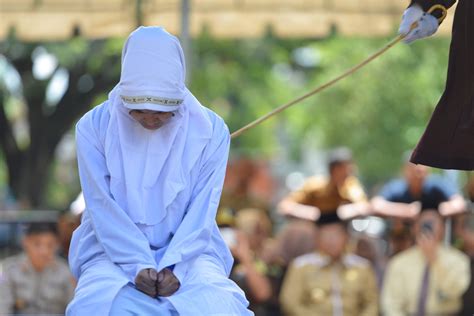 Indonesia’s Aceh Hires Female Floggers To Whip Women For Premarital Sex Cuddling In Public