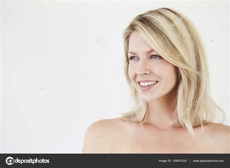 Gorgeous Smiling Blond Woman Stock Photo By ©sanneberg 149551524