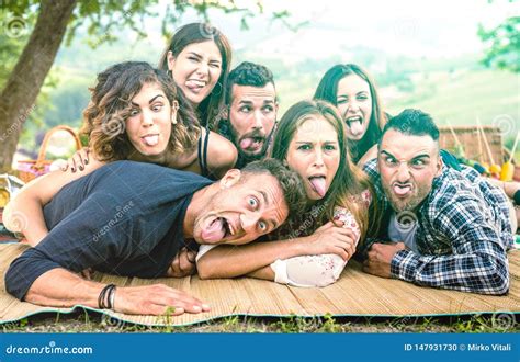 Millenial Friends Taking Selfie With Funny Faces At Pic Nic Barbecue
