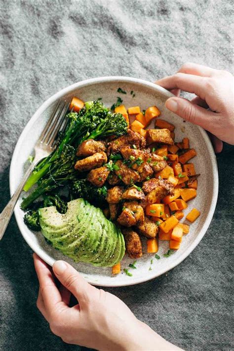 Firstly, start by cutting your sweet potatoes into wedges and place onto a baking tray. spicy chicken sweet potato meal prep magic bowls - Healthy ...