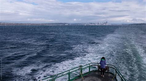 Woman Riding A Ferry From Seattle Washington By Stocksy Contributor