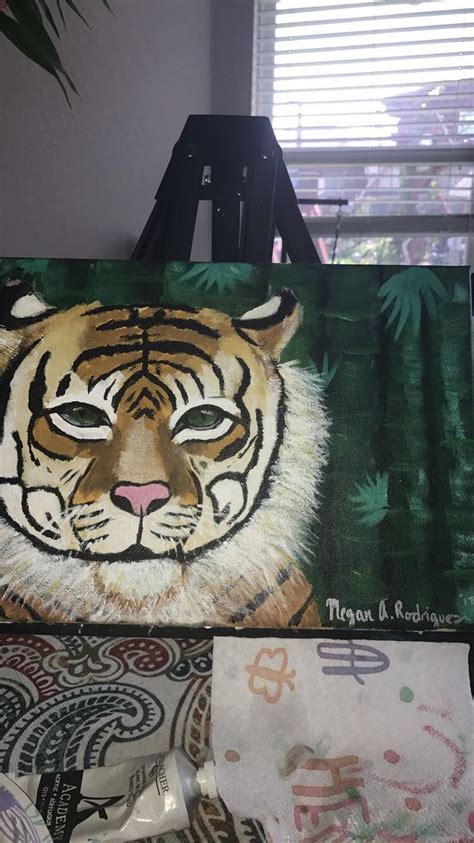 A Painting Of A Tiger On A Canvas