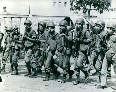 1965 Marching Soldiers Wearing M17 Gas Mask During Vietnam War 2 3