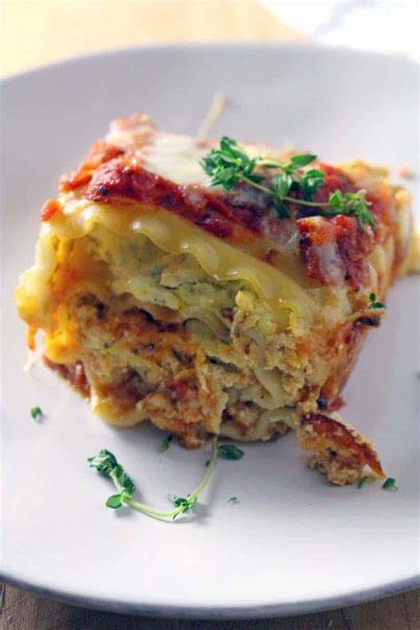 Start by laying a cooked lasagna noodle flat. Pesto Chicken Lasagna Roll-ups
