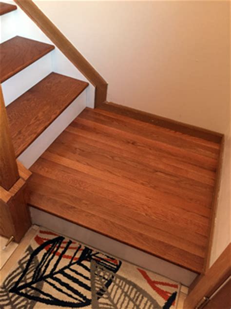 White primed poplar board which you paint any color to match your woodwork is an excellent option to save some cost while allowing the treads to pop. DIY Stairs - Dark Treads and White Risers | Hometalk