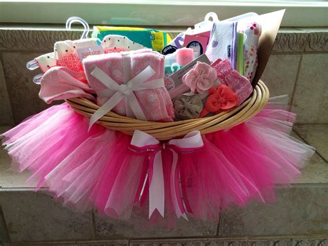 Not only will it add a decorative element to the nursery, it also makes a fun toy. Baby shower tutu gift basket DIY | Diy baby shower gifts ...