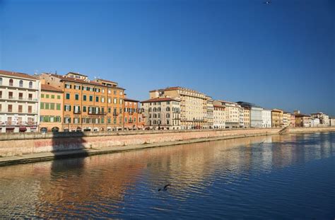 Cityscape With Pisa Old Town And Arno River In Tuscany Italy Stock
