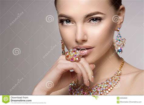 Beautiful Woman In A Necklace Earrings And Ring Model In Jewel Stock