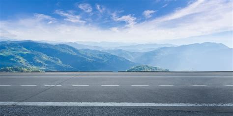 Empty Highway Asphalt Road And Beautiful Sky Premium Photo