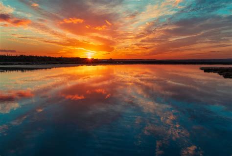 Free Images Mirror Sunset Reflection Body Of Water Horizon Nature Afterglow Natural