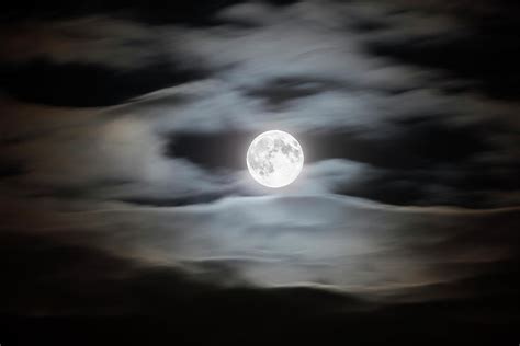 Full Moon On A Cloudy Night Sky Photograph By Bjorn Holland Fine Art