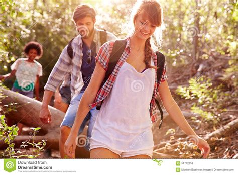 Group Of Friends On Walk Through Countryside Together Stock Image