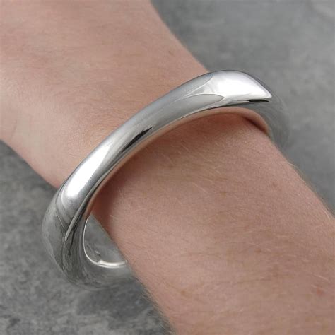 Chunky Sterling Silver Flowing Bangle By Otis Jaxon