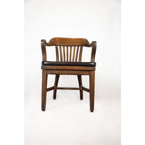 This chair has its own charm. 1920s Vintage Wooden Arm Chair | Chairish