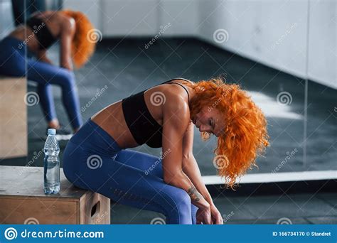 Tired Taking A Break Sporty Redhead Girl Have Fitness Day In Gym At
