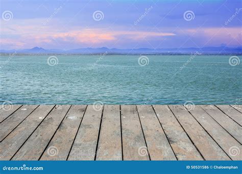 Beauty Sunset Over Lake On Wooden Floor Stock Photo Image Of Nature