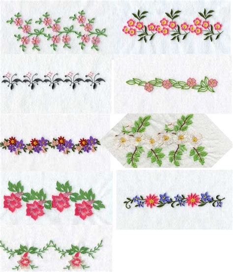 Embroidered Flowers And Leaves On White Paper With Green Stems Pink