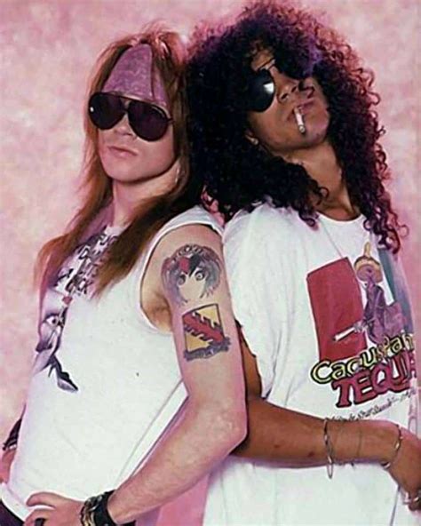 Long auburn hair and red bandana like slash, axl's most distinct costume piece is his coif, which usually has a bandana tied around it. Axl Rose and Slash Guns n Roses - Snog The Frog