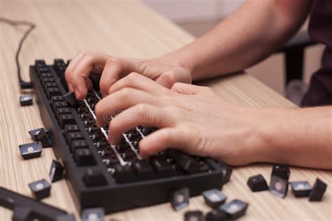 Man Smashes A Mechanical Computer Keyboard In Rage Using Both Fists