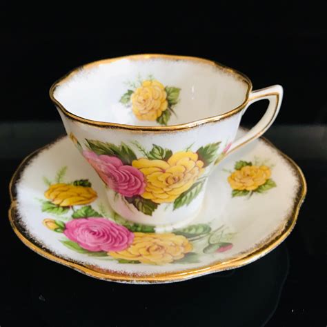 Rosina Tea Cup And Saucer Fine Bone China England Large Pink And Yellow Floral Heavy Gold Trim