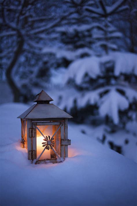 Close Up Of Glowing Lantern In Snow Photograph By Culturachristoffer