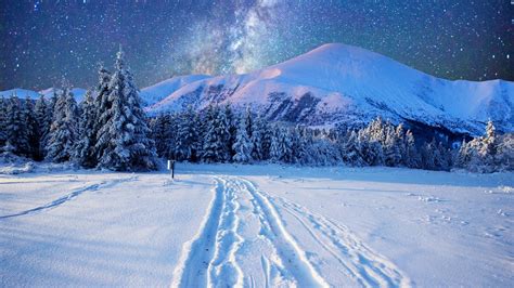 1920x1080 Milky Way On The Night Sky Over The Snowy Winter Wallpaper