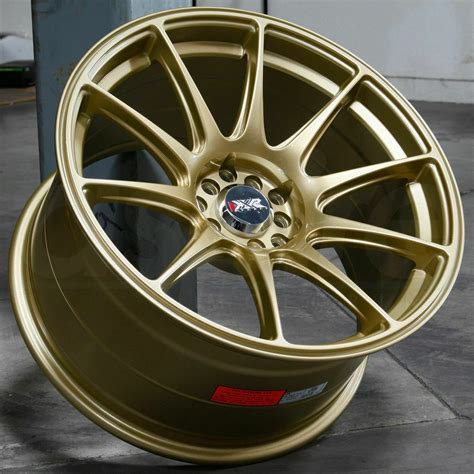 One 15x825 Xxr 527 4x1004x1143 0 Gold Wheel Rim Wheels
