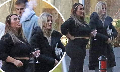 Lauren Goodger Flashes Her Midriff In A Black Crop Top And Leggings As She Enjoys Dinner With